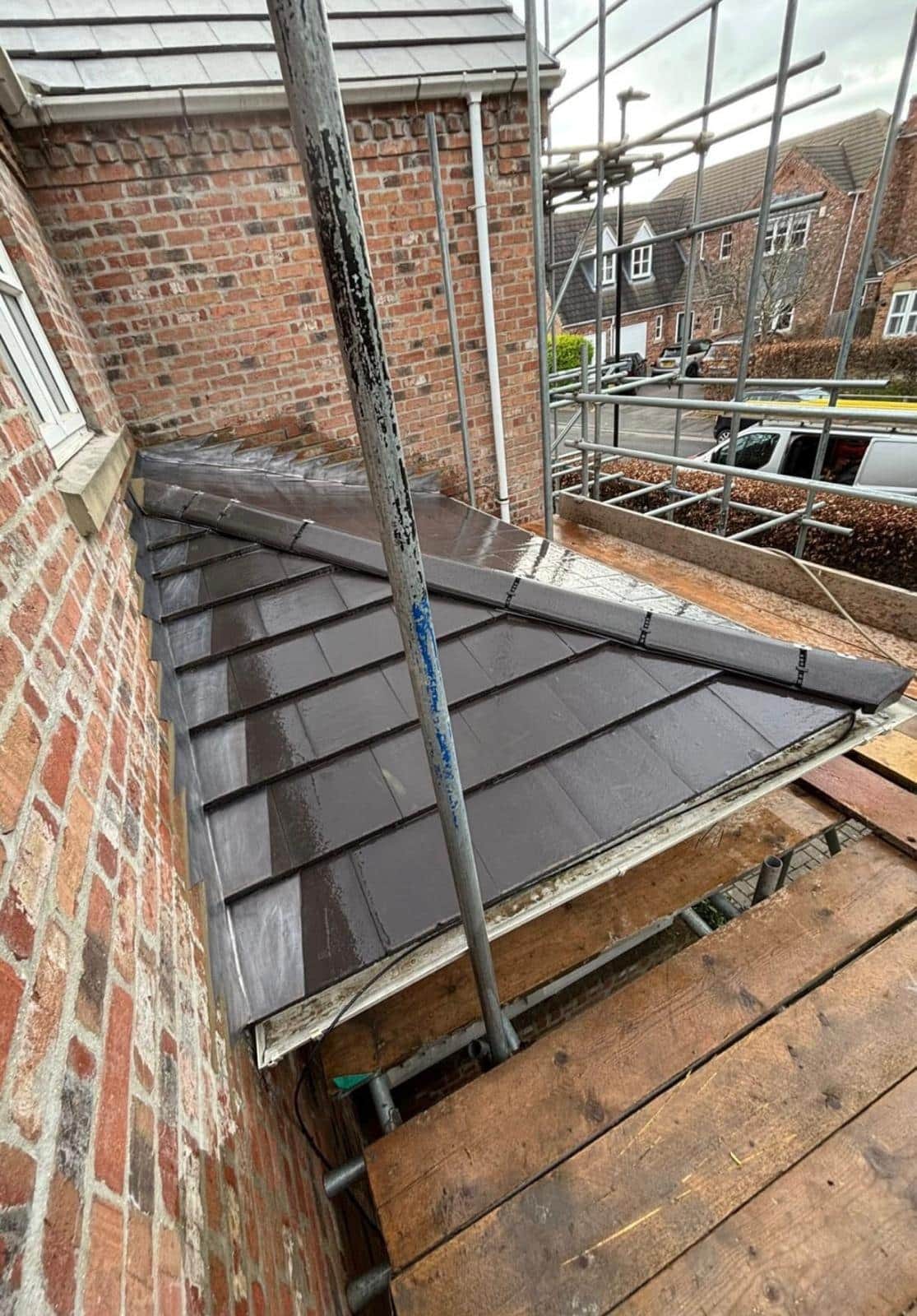 A completed roofing and building project by J P Building Services