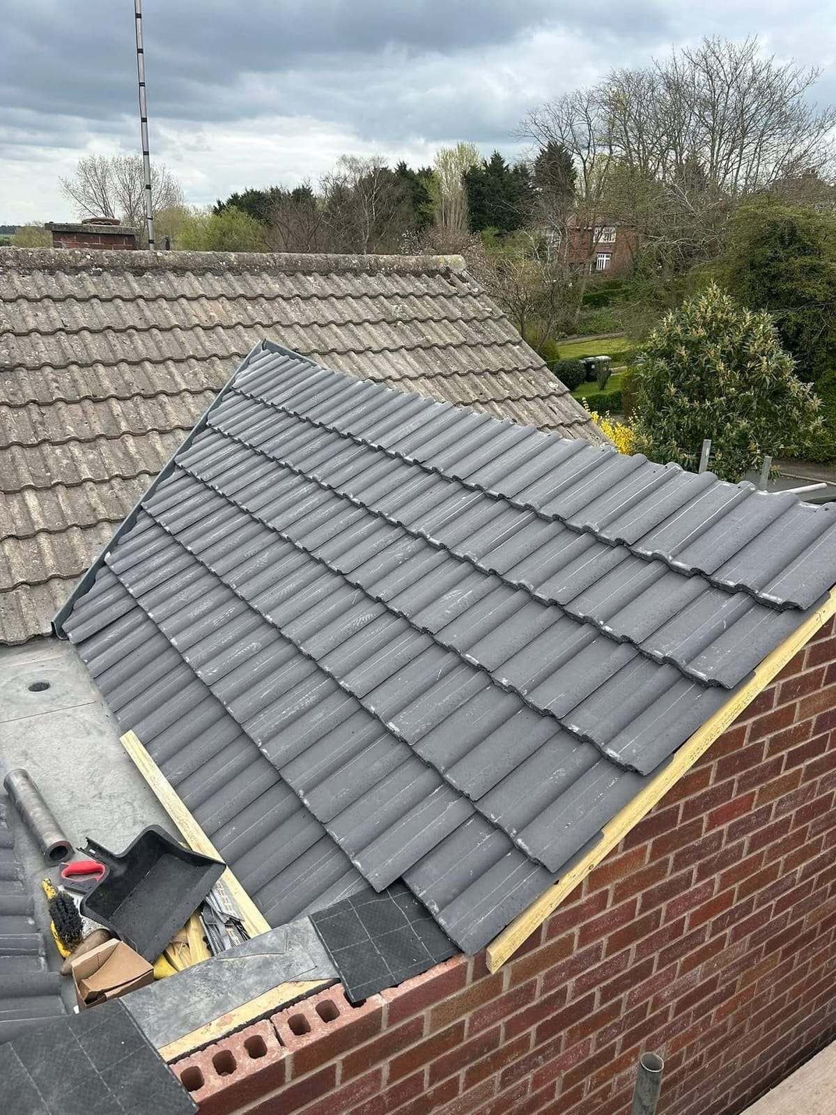 A completed roofing and building project by J P Building Services