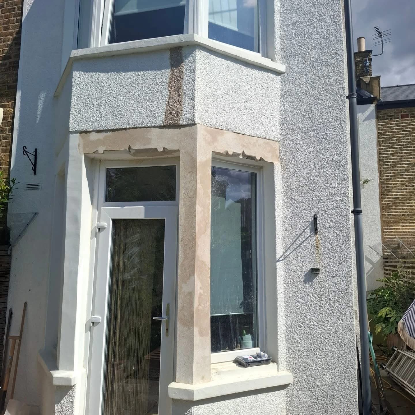 A completed rendered bay frontage by J P Building Services
