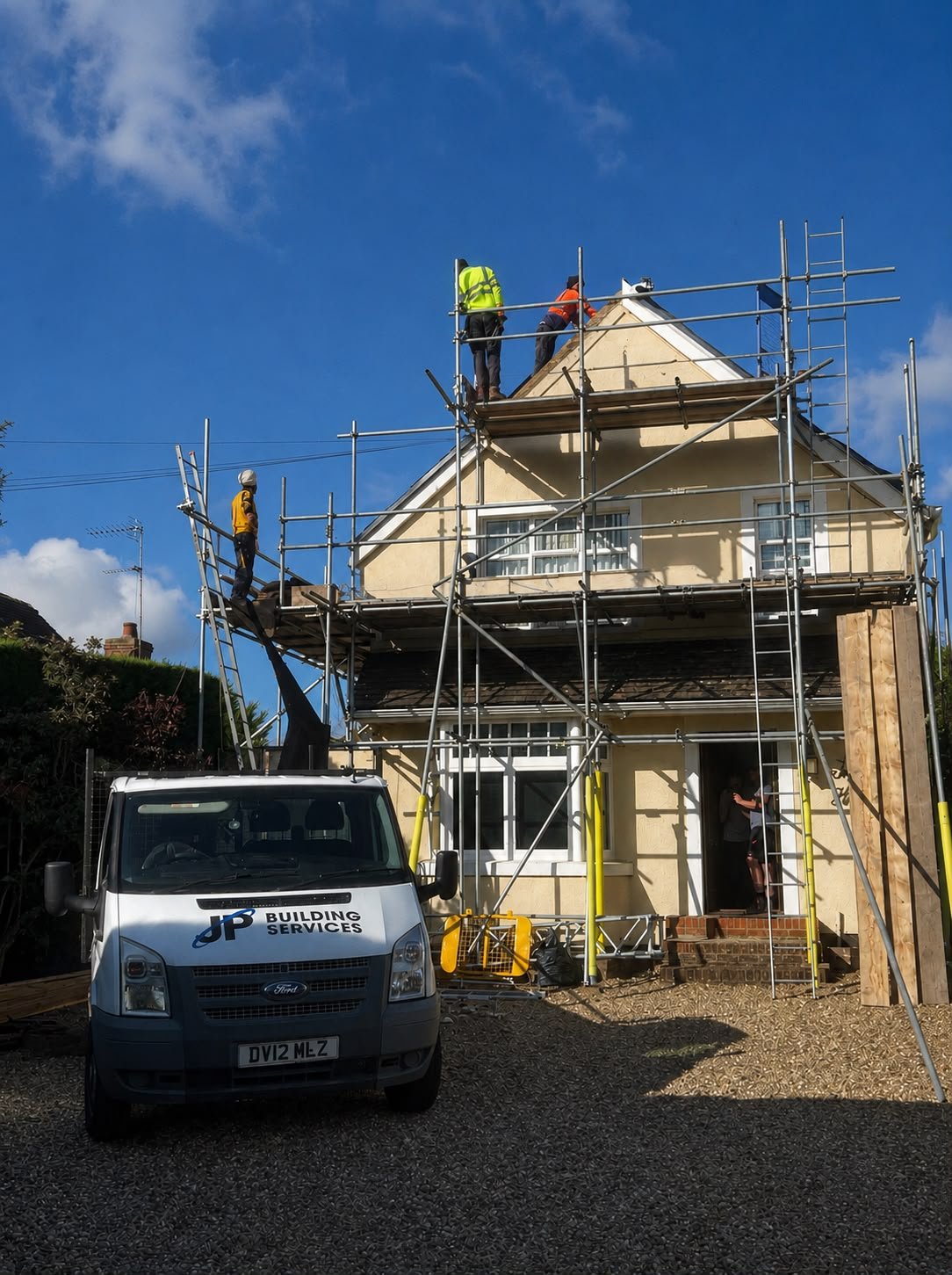 A maintenance team working on a residential property