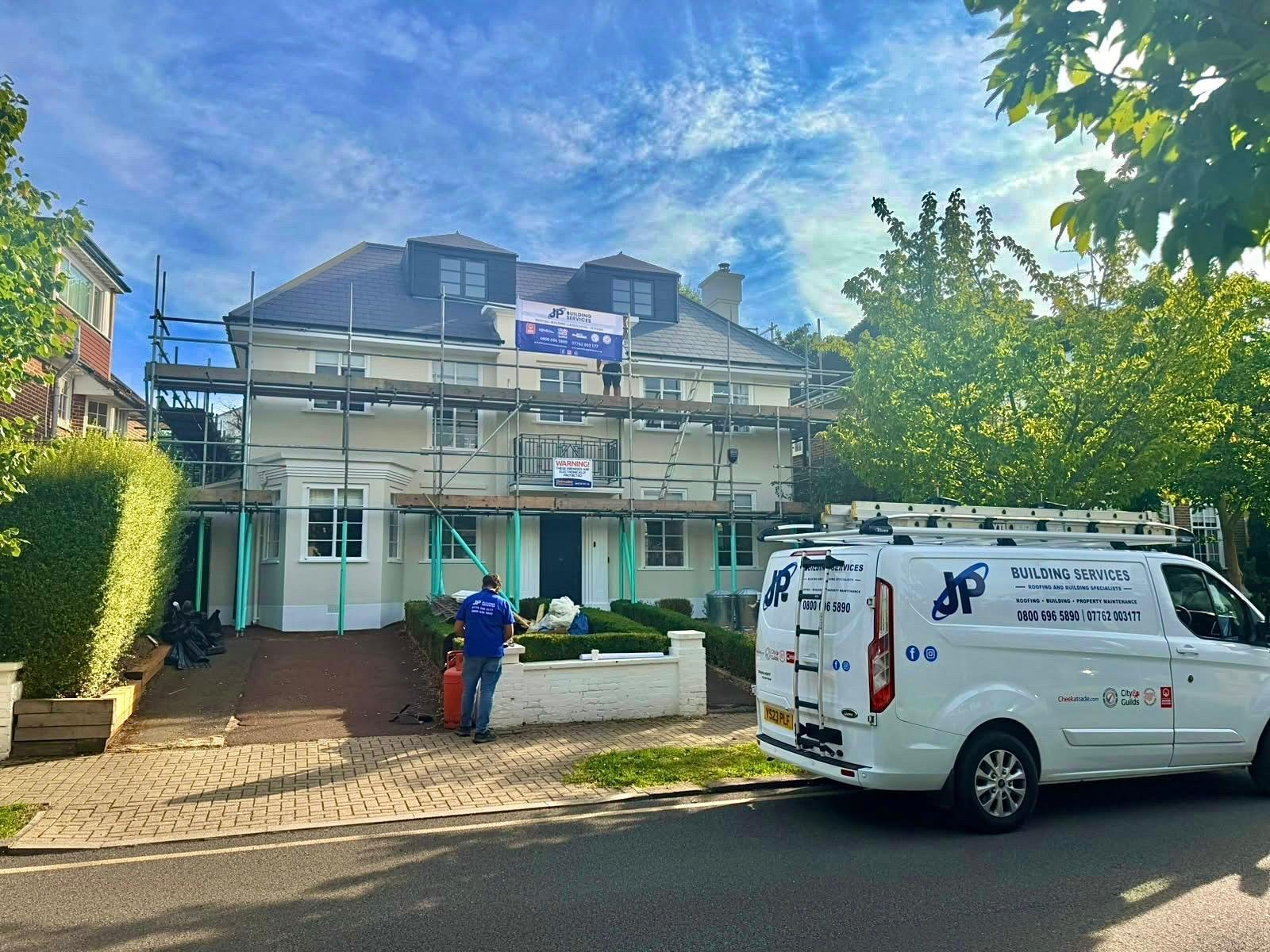 A rendered property with the J P Building Services van outside