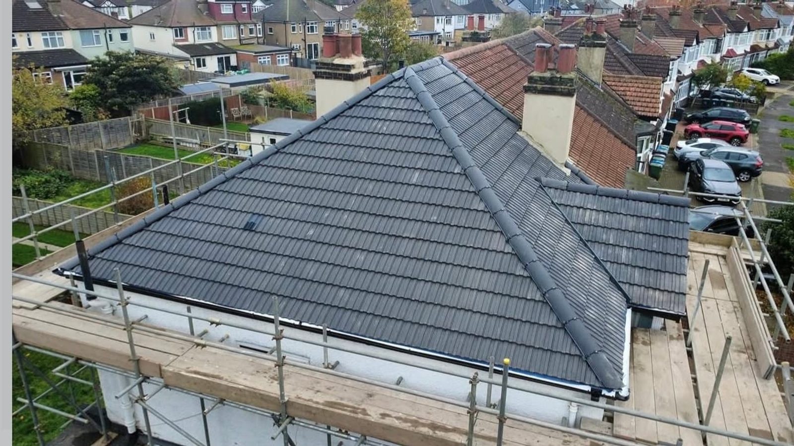A pitched tiled roof completed by J P Building Services