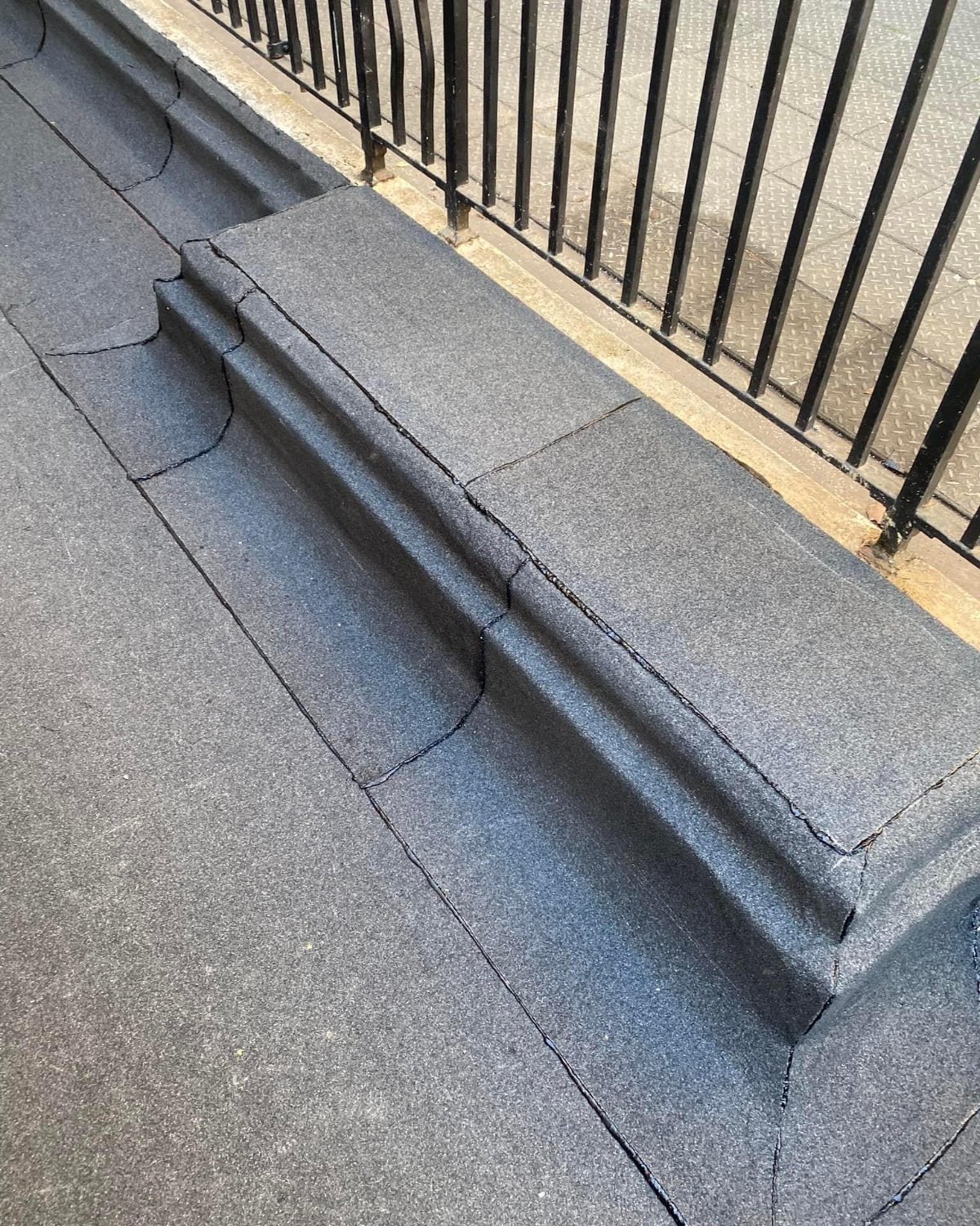 A newly laid flat roof on a house extension
