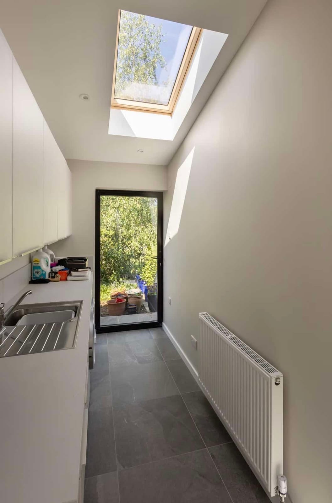 A renovated interior room with fresh plaster and paint